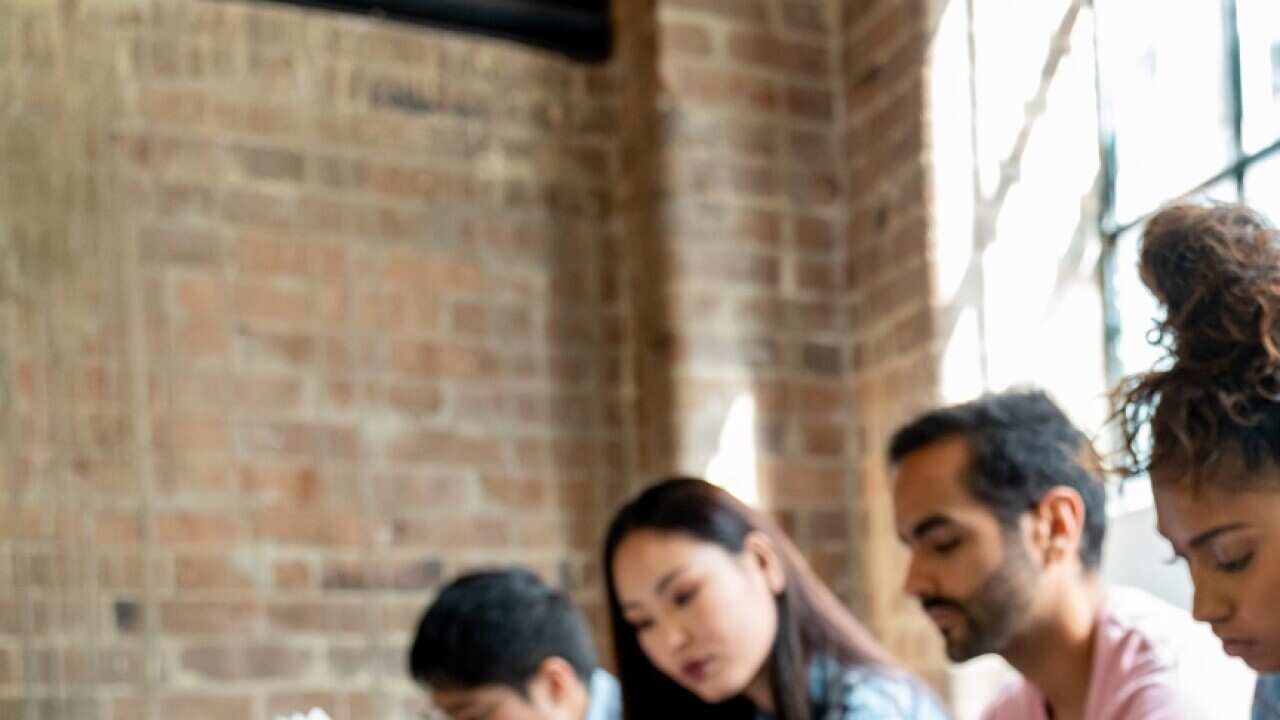 People at the office waiting for a job interview