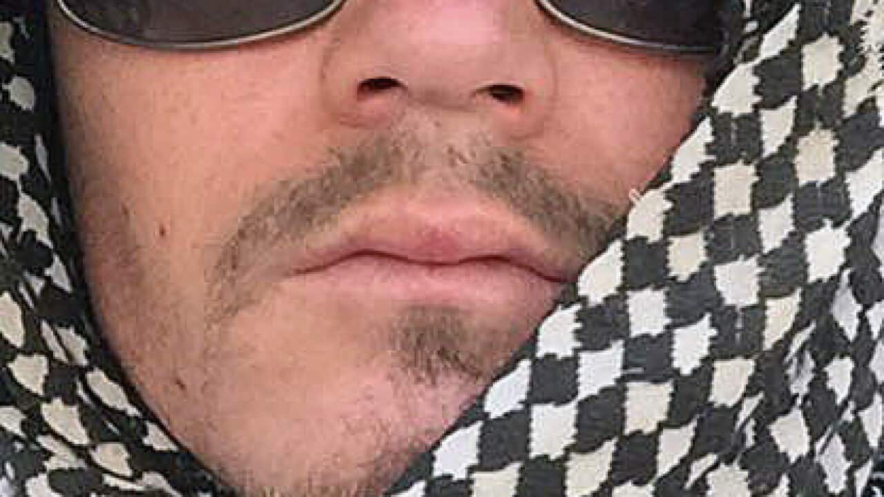 Supplied undated image obtained Friday, Dec. 4, 2015 of Queensland man Ashley Dyball, also known as Mitchell Scott, who has been fighting alongside Kurdish forces battling Islamic State in Syria. (AAP Image/Facebook, Mitchell Scott) 