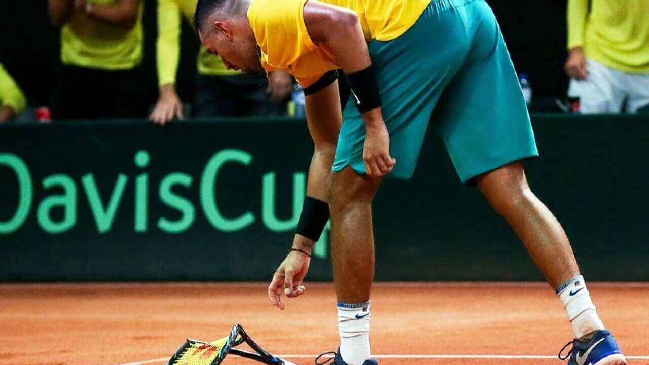 Nick Kyrgios smashes a frame