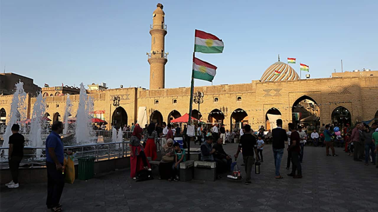 Kurdish flags wave in central Irbi