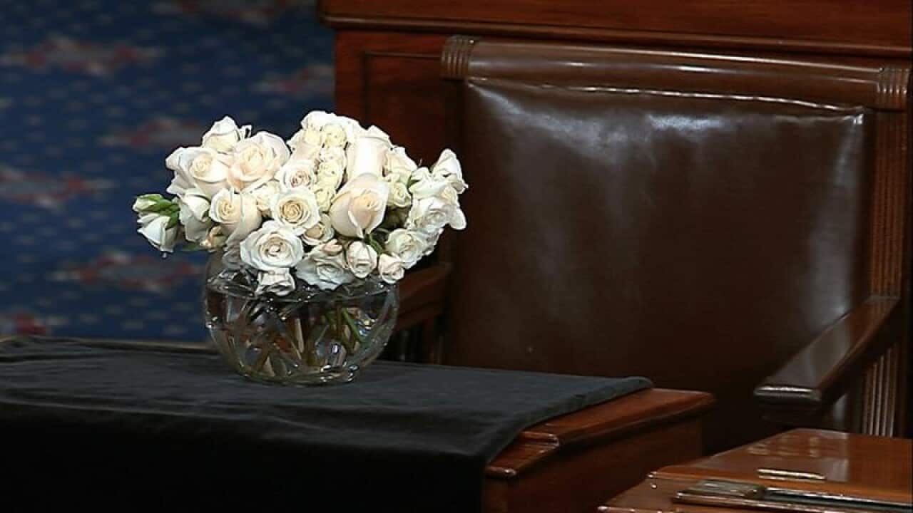 Senator McCain's desk in the US Senate is draped in black.