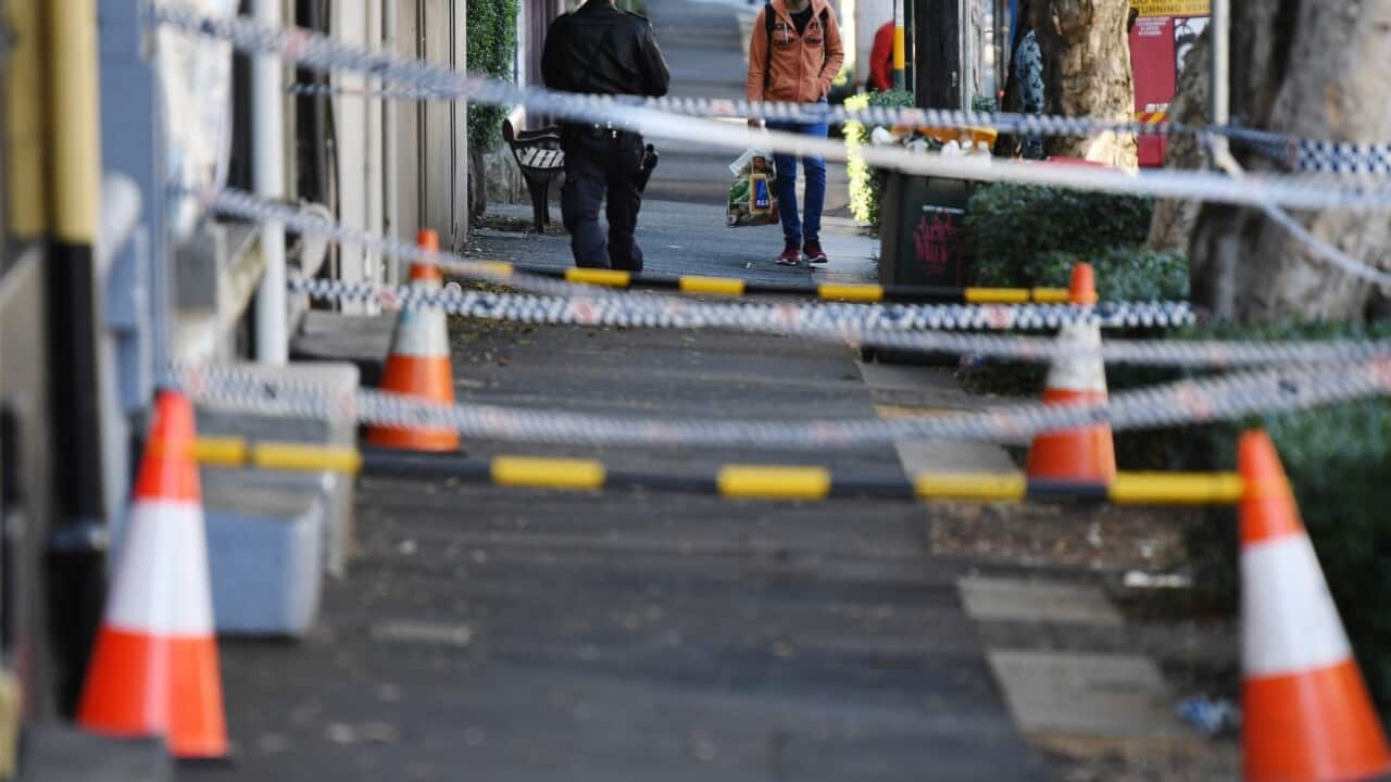 Police tape blocks of a section of pavement outside the front of of a property in Surrey Hills in Sydney, Tuesday, August 1, 2017.