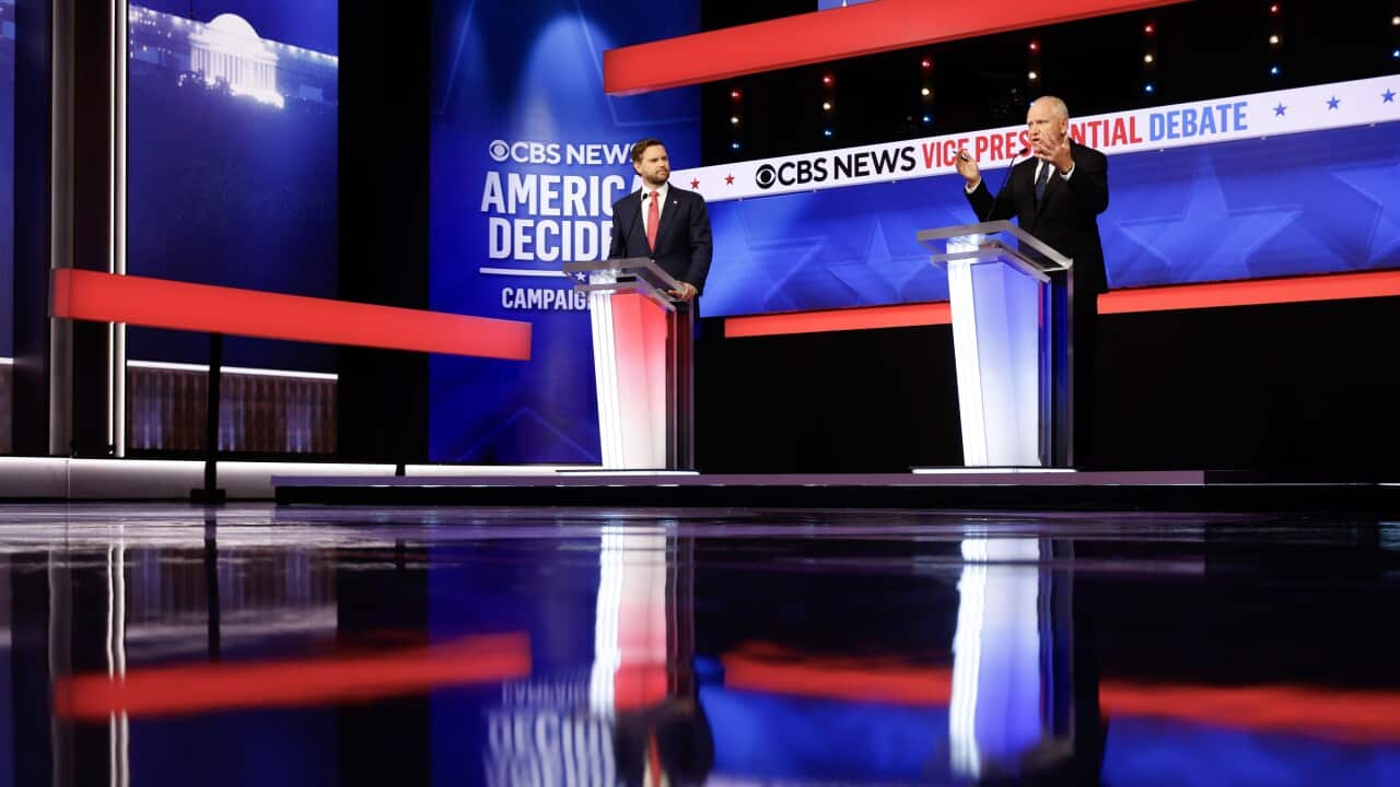 JD Vance and Tim Walz onstage as part of the Vice Presidential debate in New York