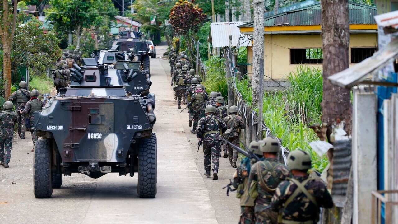Government troops head to the frontline as fighting with Muslim militants in Marawi city enters its second week, Tuesday, May 30, 2017