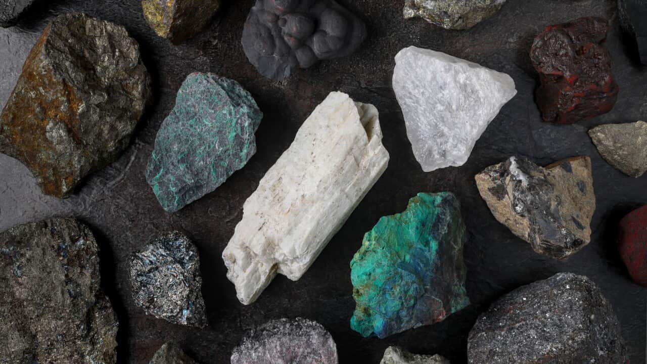 Mixture of critical minerals (United States of America definition), or critical raw materials (European Union definition). Flatlay on slate background