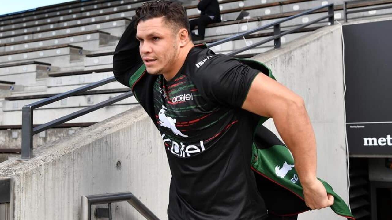 James Roberts pulls on his training jacket.