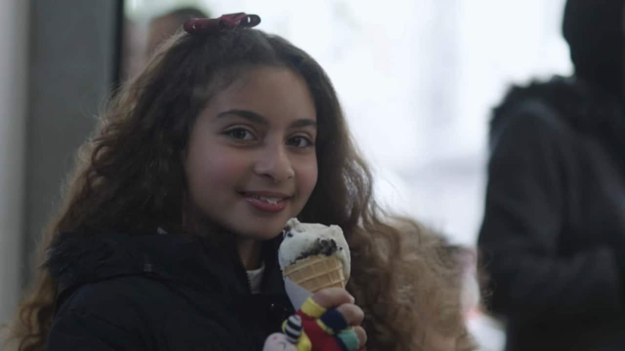 Girl with ice cream in Gaza cafe (SBS).png
