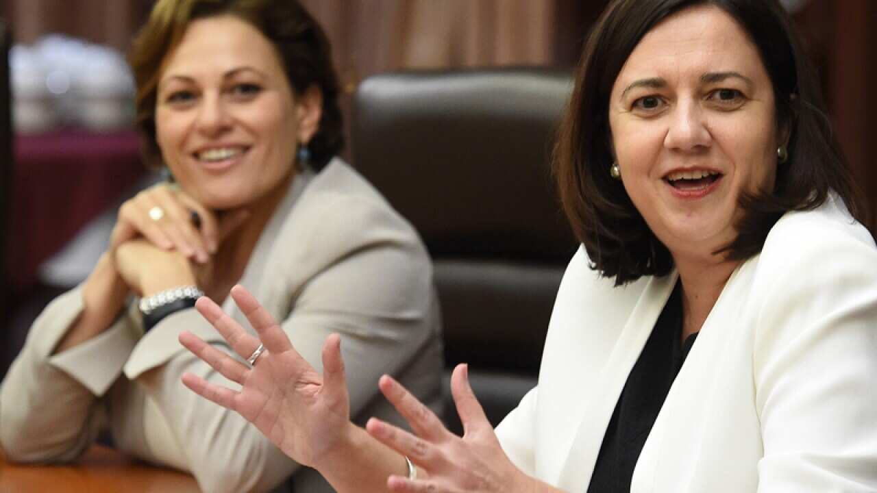 Premier Annastacia Palaszczuk (right) and Deputy Premier Jackie Trad