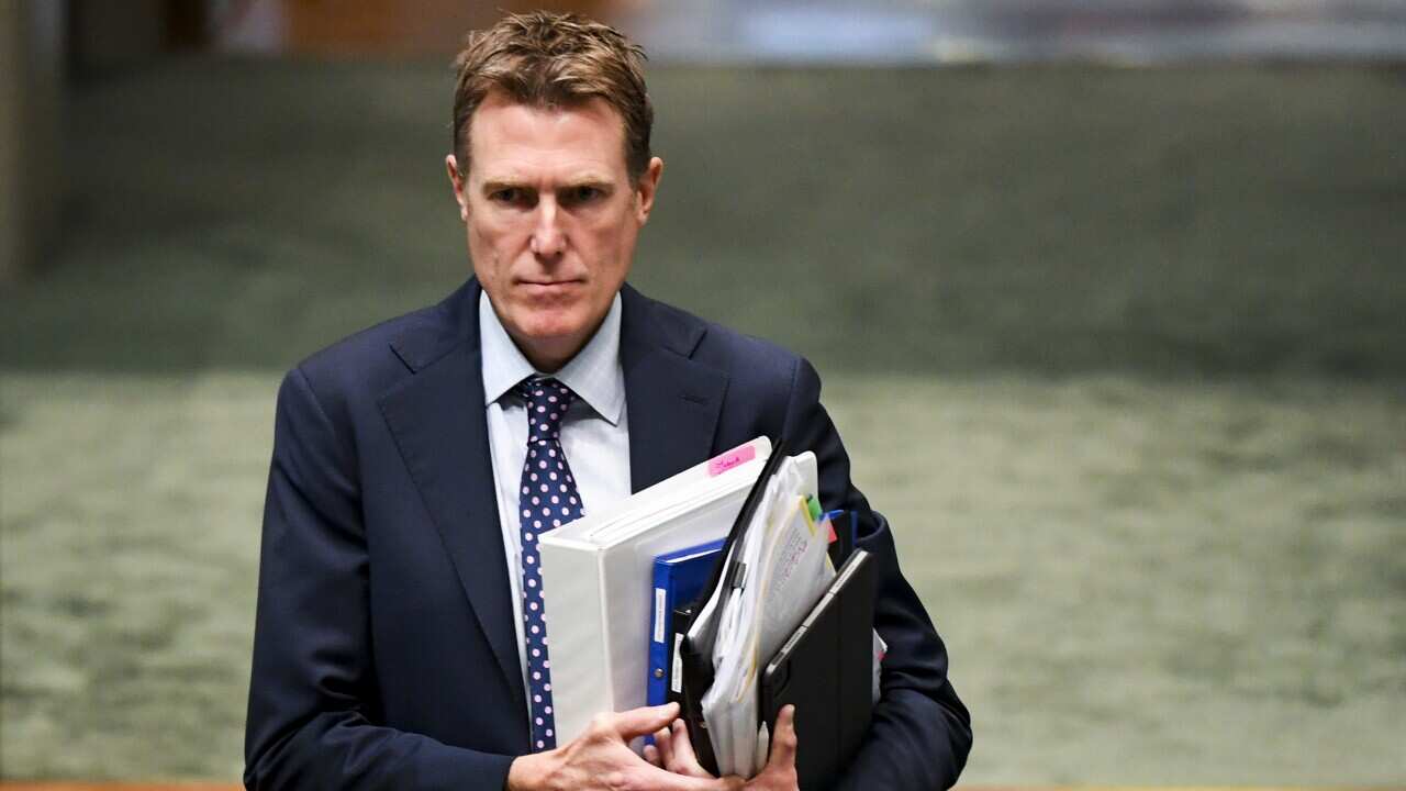 Industry Minister Christian Porter arrives during Question Time at Parliament House in Canberra.