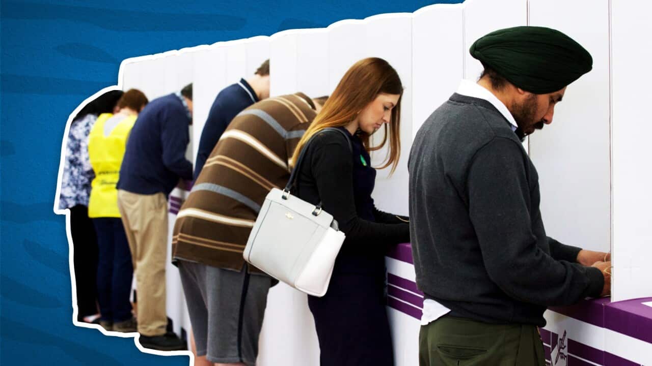 Voters in a polling booth