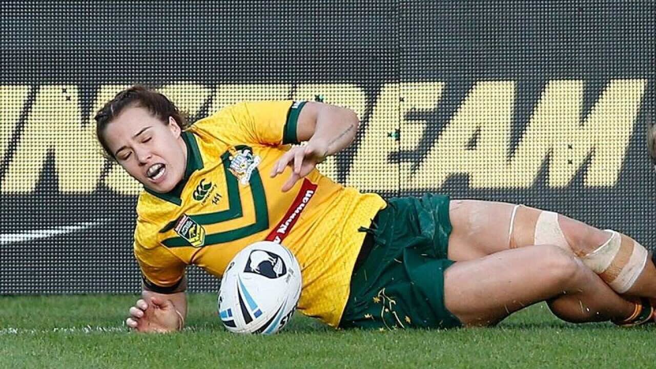 Isabelle Kelly of Australia scores the winning try.