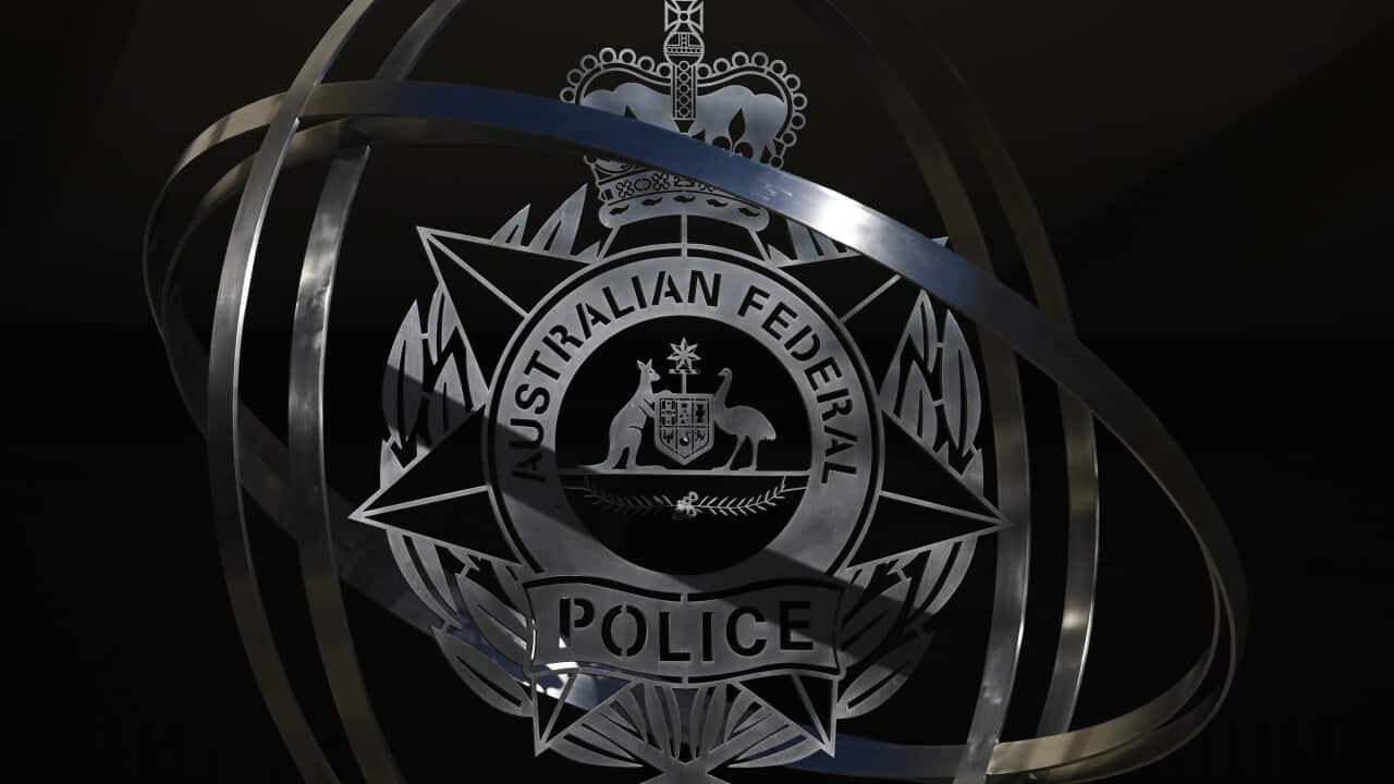 The Australian Federal Police (AFP) emblem is seen outside the Australian Federal Police (AFP) Headquarters in Canberra.