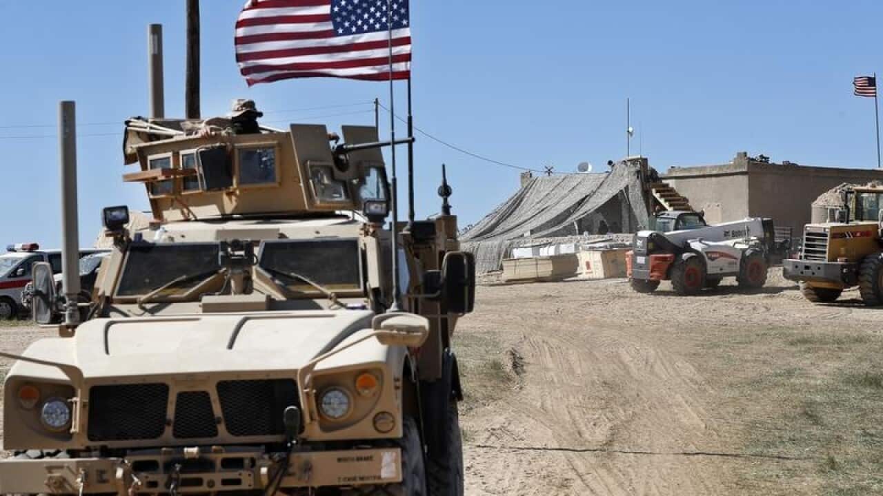 A US military official says the US-led military coalition has begun withdrawing troops from Syria.