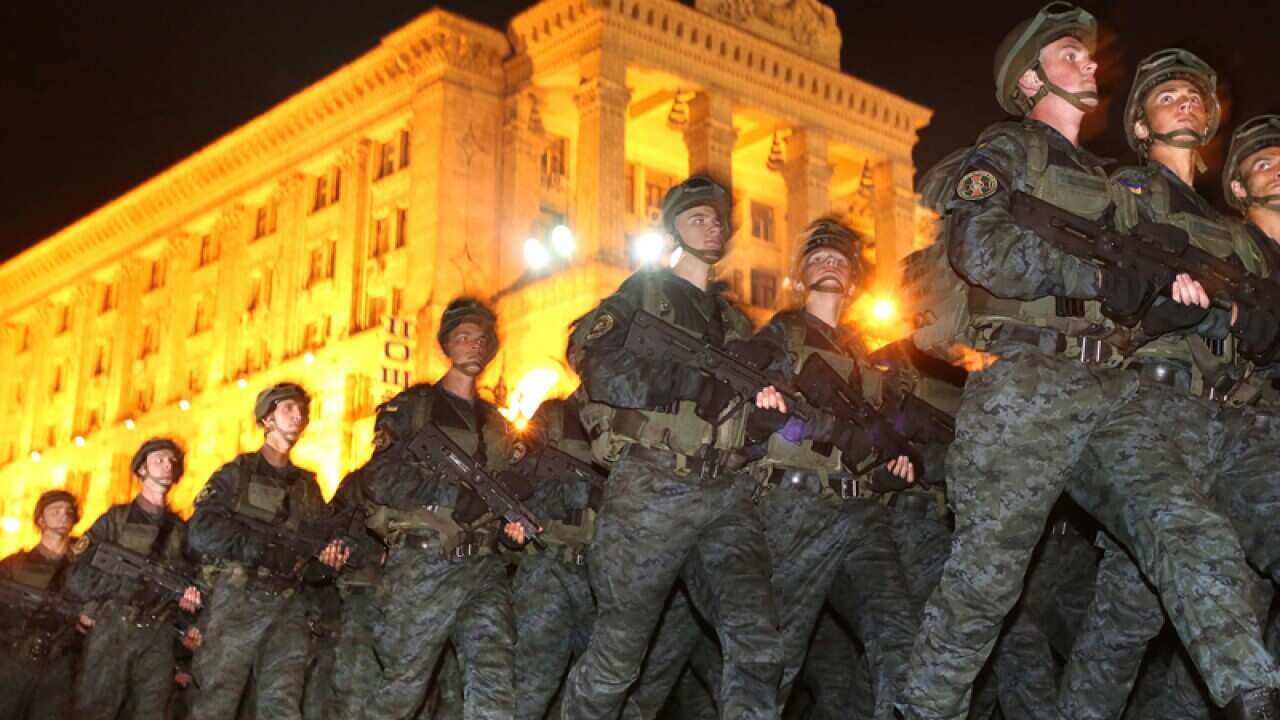 Ukrainian soldiers march.
