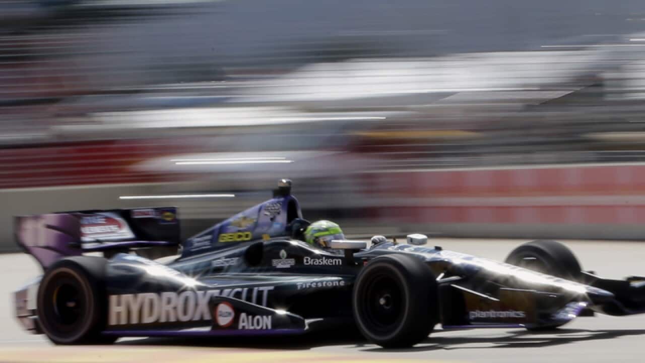 Tony Kanaan, of Brazil in action.