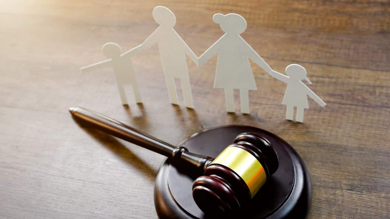 Family law concept. Family Paper and Judge gavel on the table