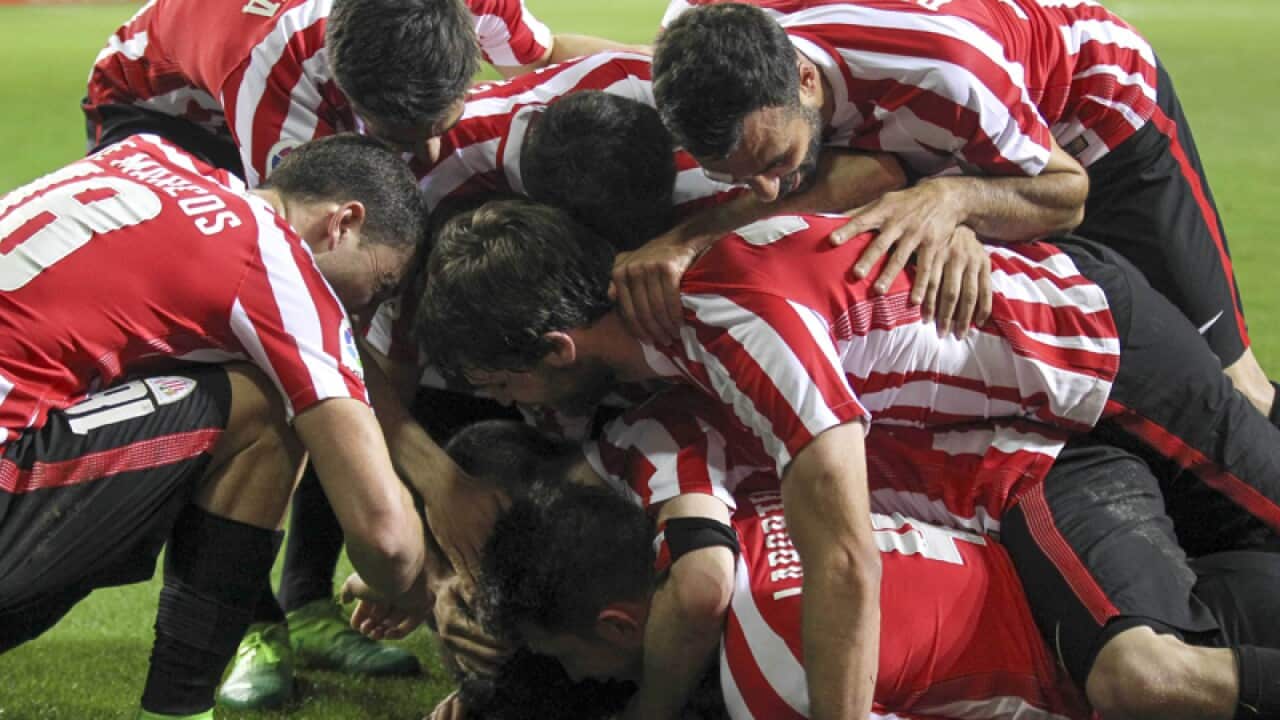 Athletic Bilbao players celebrate after scoring