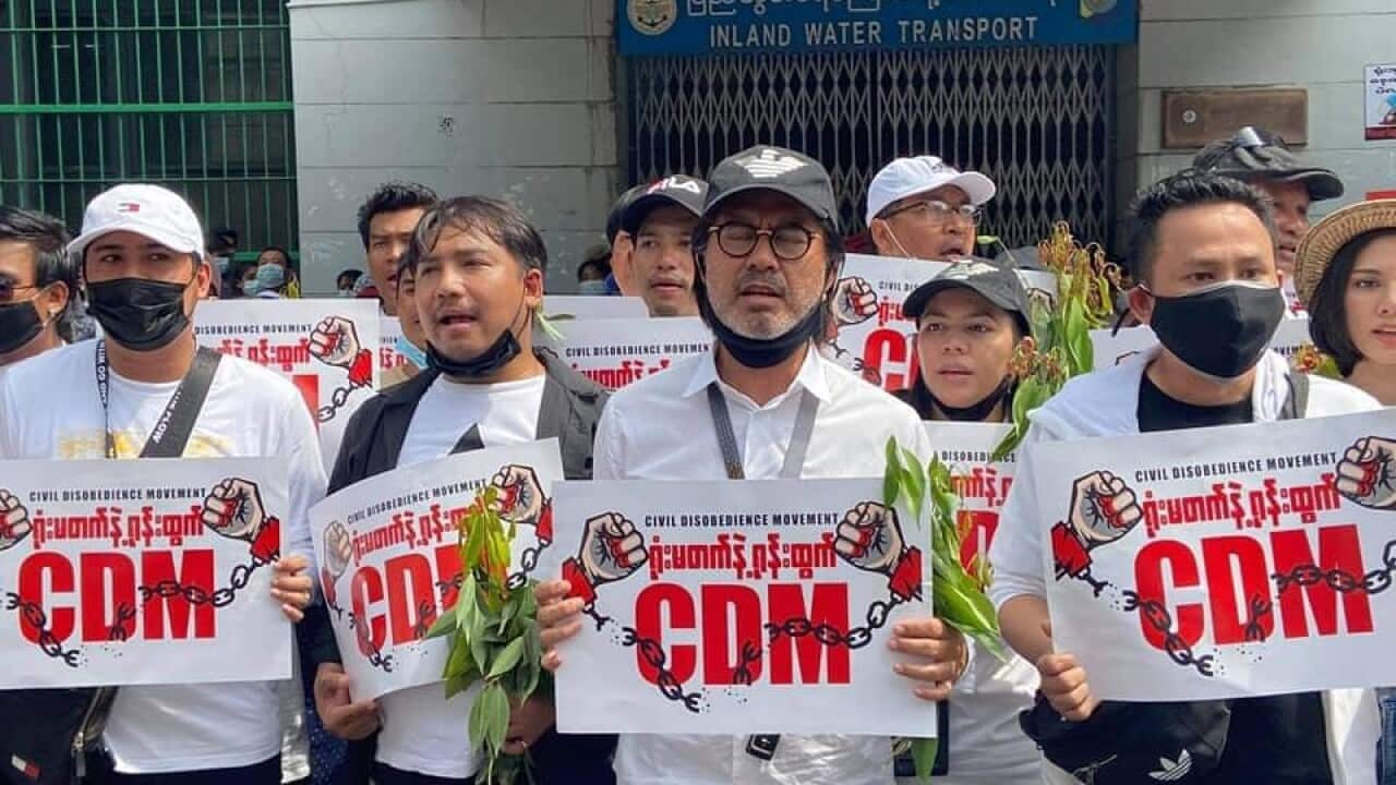 Min Maw Kun (right) protests against the military coup in Myanmar alongside other celebrities.