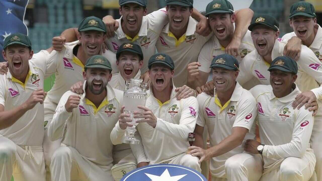 Australian players celebrate their win over England