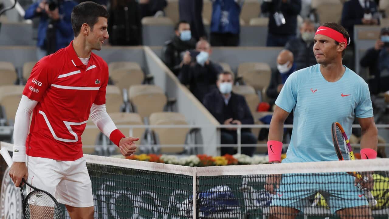 Serbia's Novak Djokovic, left, and Spain's Rafael Nadal