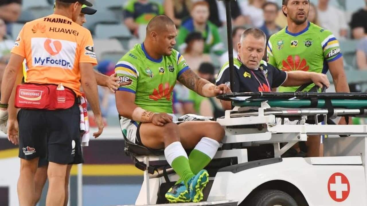 Canberra Raiders centre Joseph Leilua is stretchered from the field