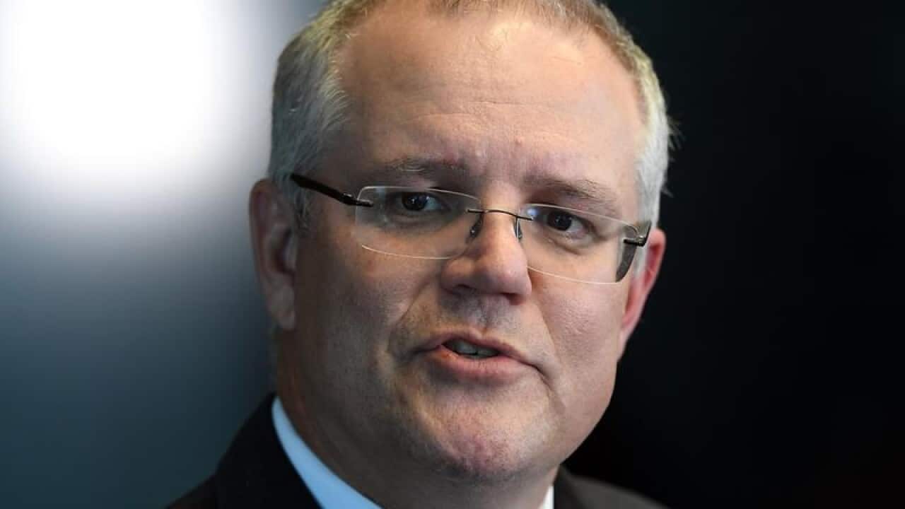 Federal Treasurer Scott Morrison speaks to the media.