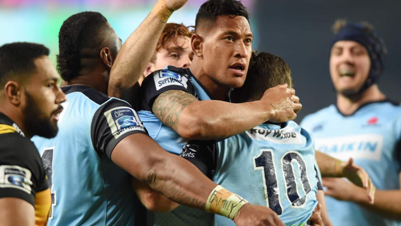 Israel Folau of the Waratahs celebrates a try