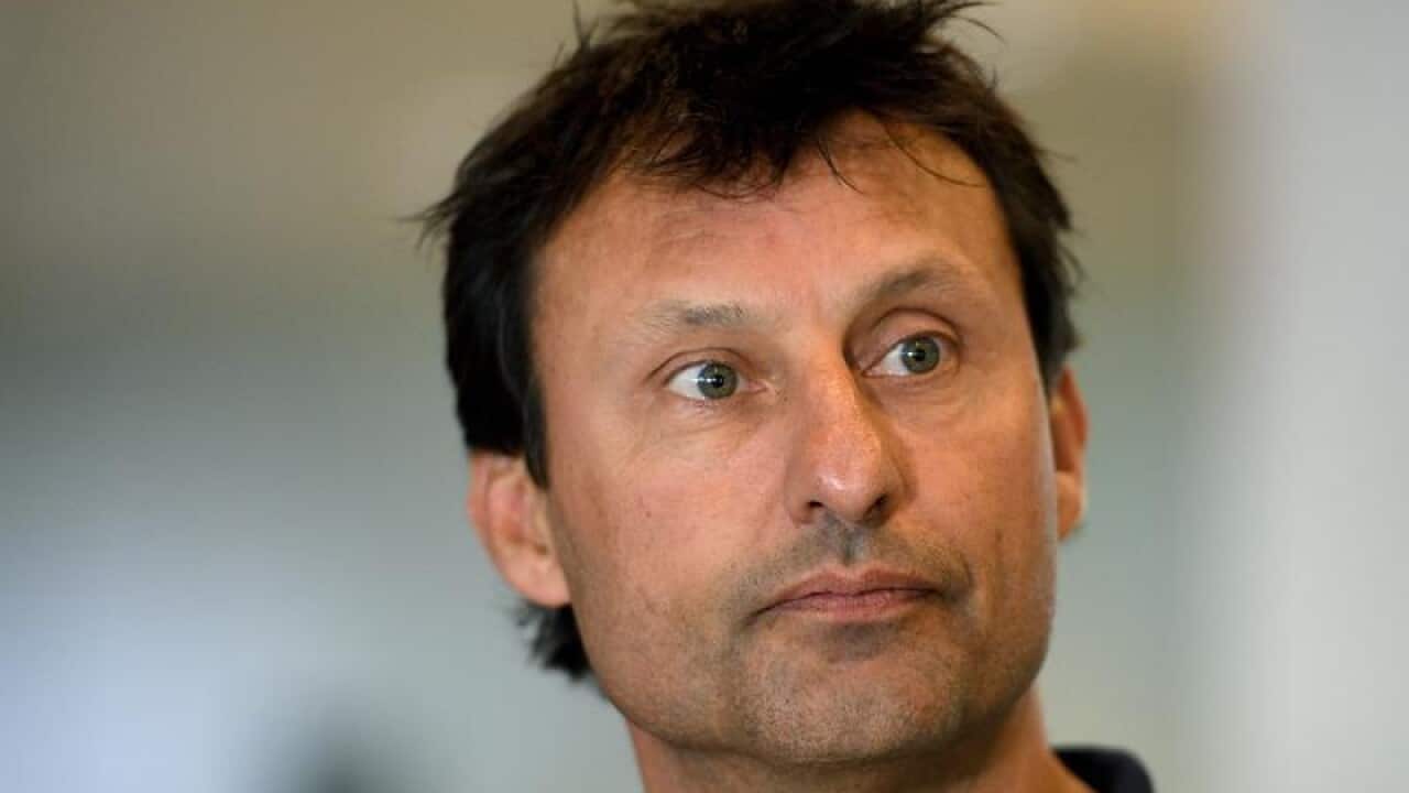Indigenous All-Stars coach Laurie Daley looks on
