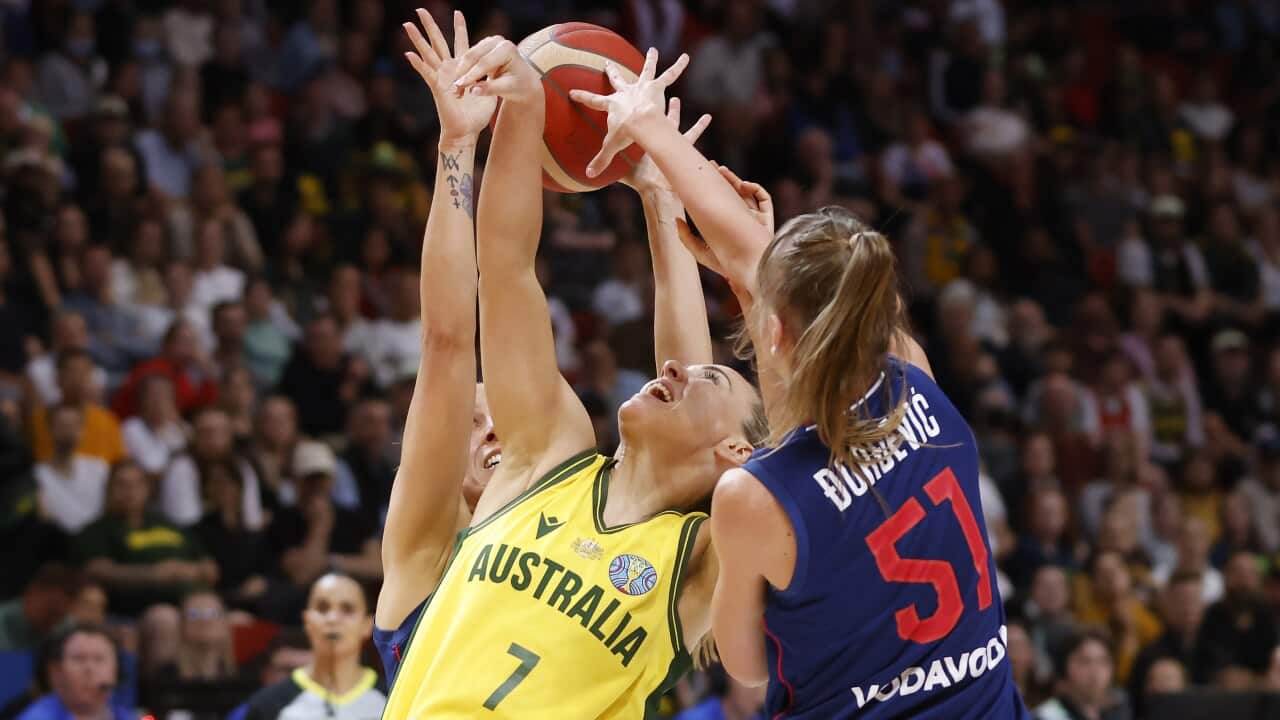 Tess Magden of Australia competes for the ball with Mina Djordjevic of Serbia during the 2022 FIBA Women's Basketball World Cup match between Australia and Serbia at Qudos Bank Arena in Sydney