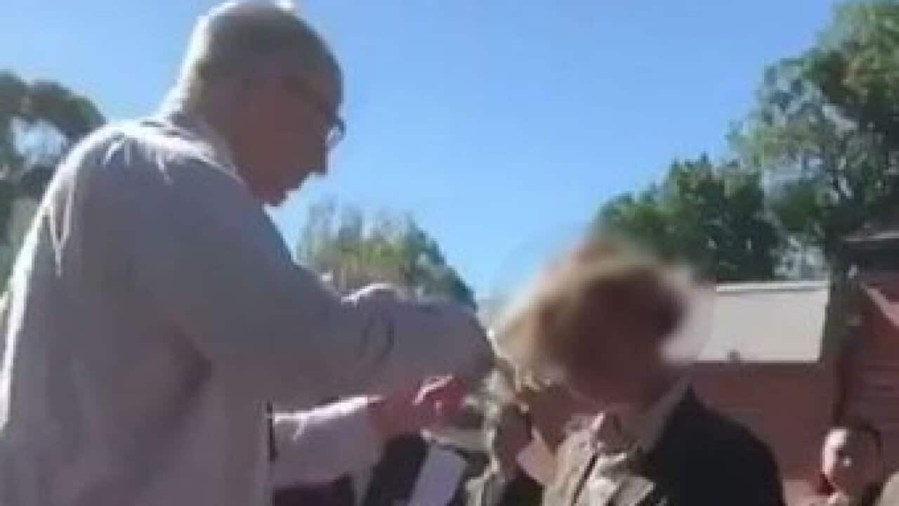 Trinity Grammar's deputy principal Rohan Brown was sacked after cutting a student's hair before school photos were taken.