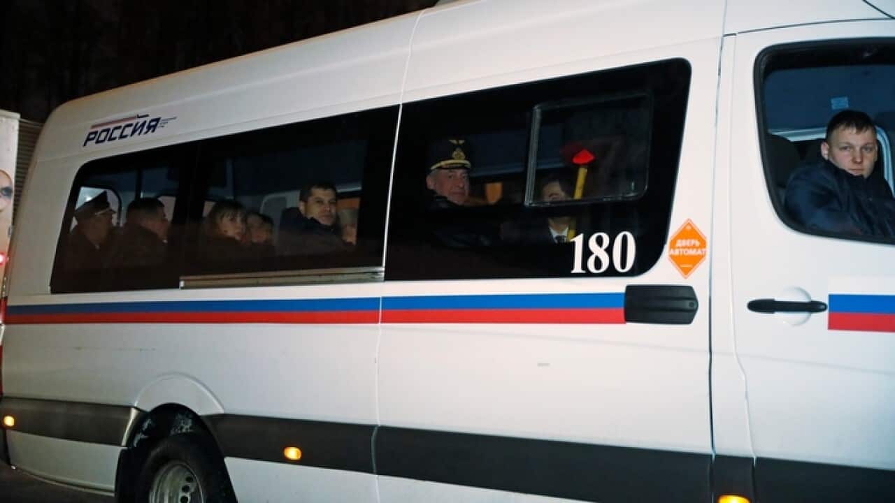 A bus carrying Russian diplomats ordered to leave Britain
