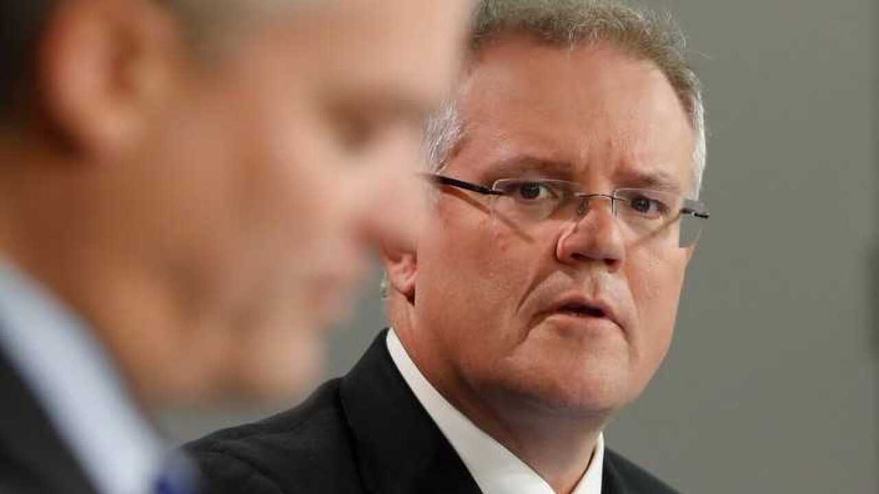 Scott Morrison, with Mathias Cormann in foreground