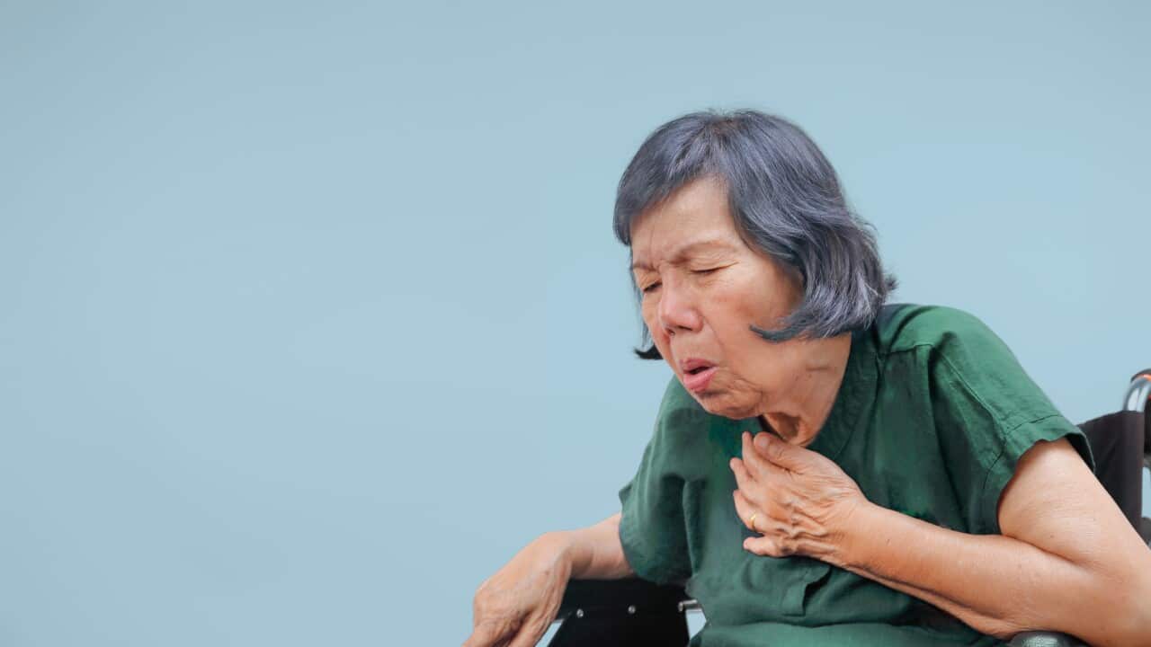 elderly woman choking