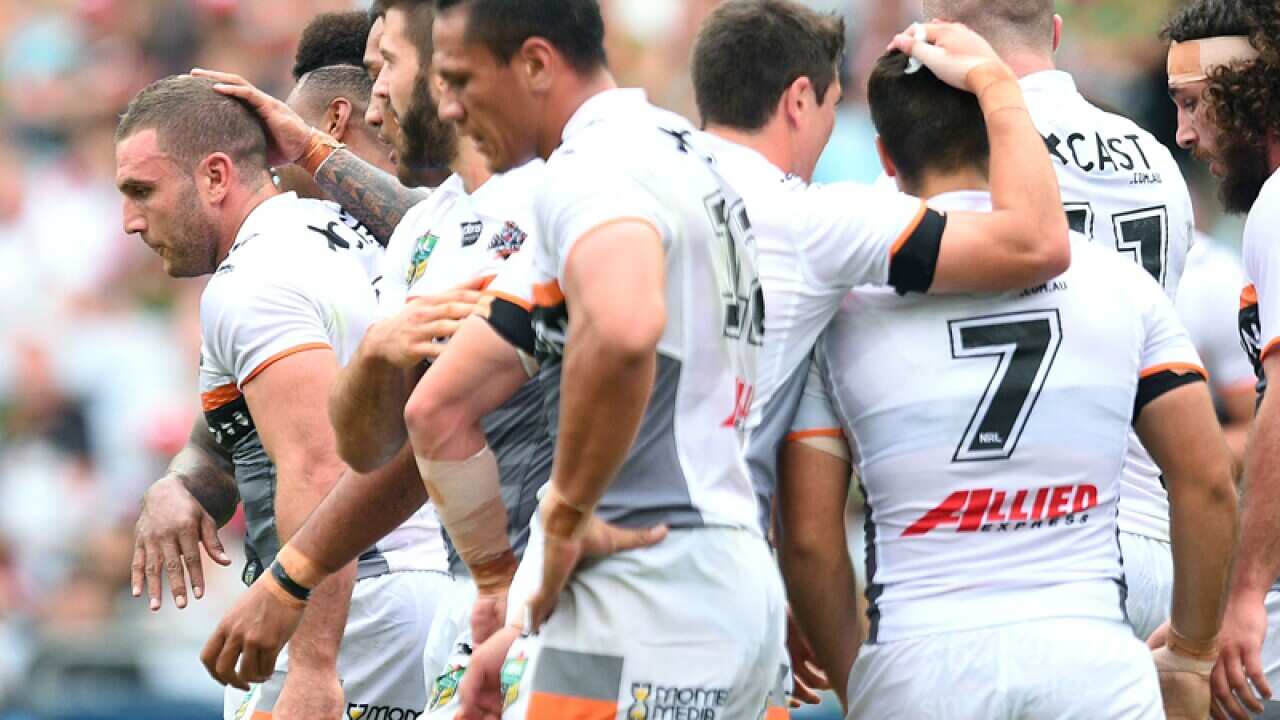 Robbie Farah of the Tigers (left)