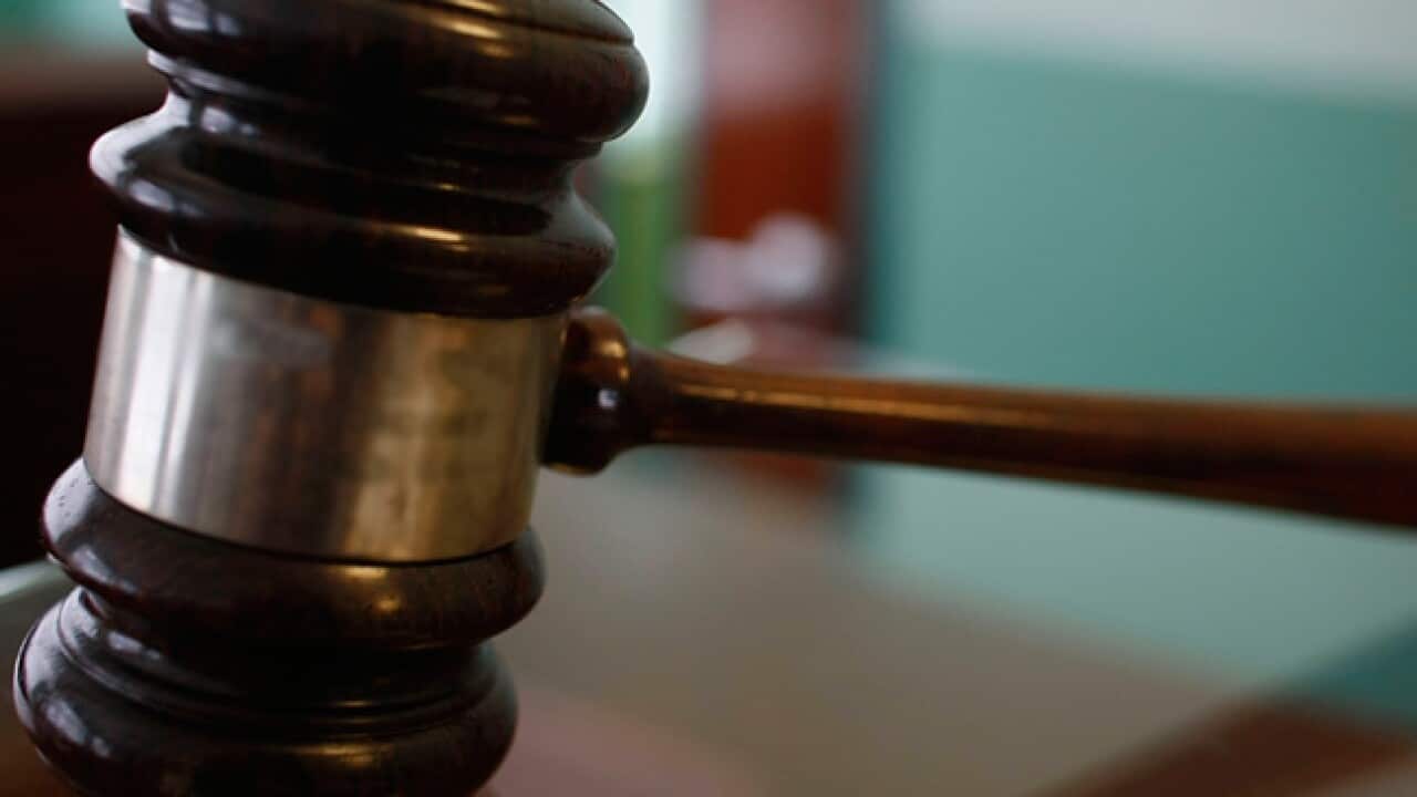 a close up of a judge gavel