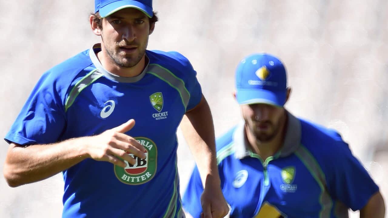 Australian cricketers Joe Burns (L) and Shaun Marsh