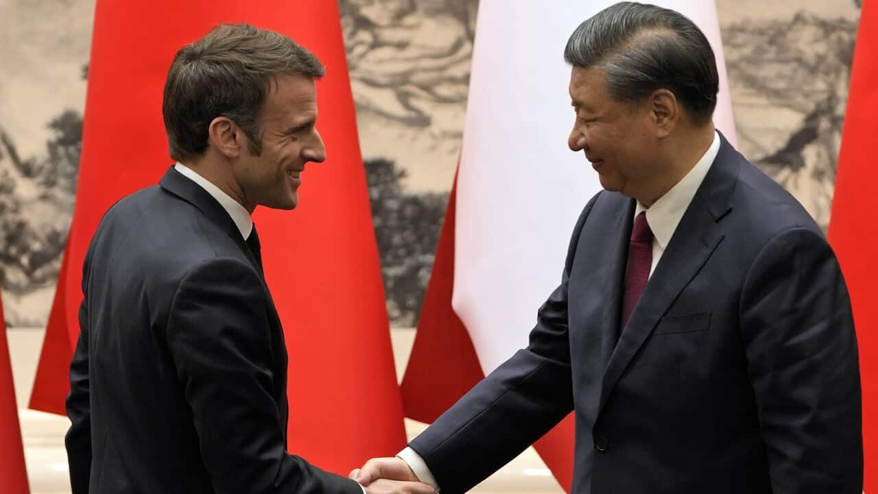 Two men shaking hands.