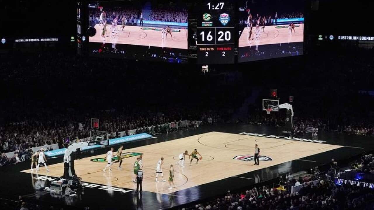 Players are seen on the court.