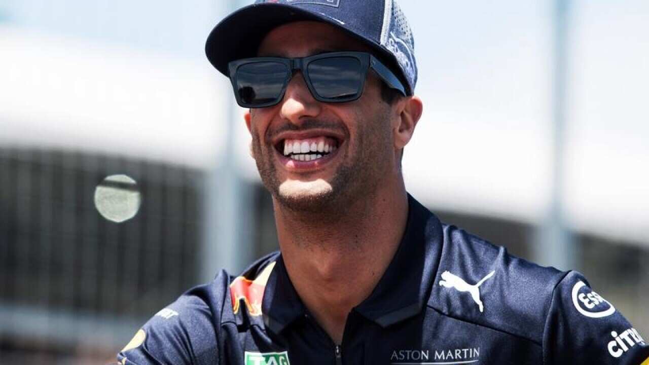 Daniel Ricciardo smiles.