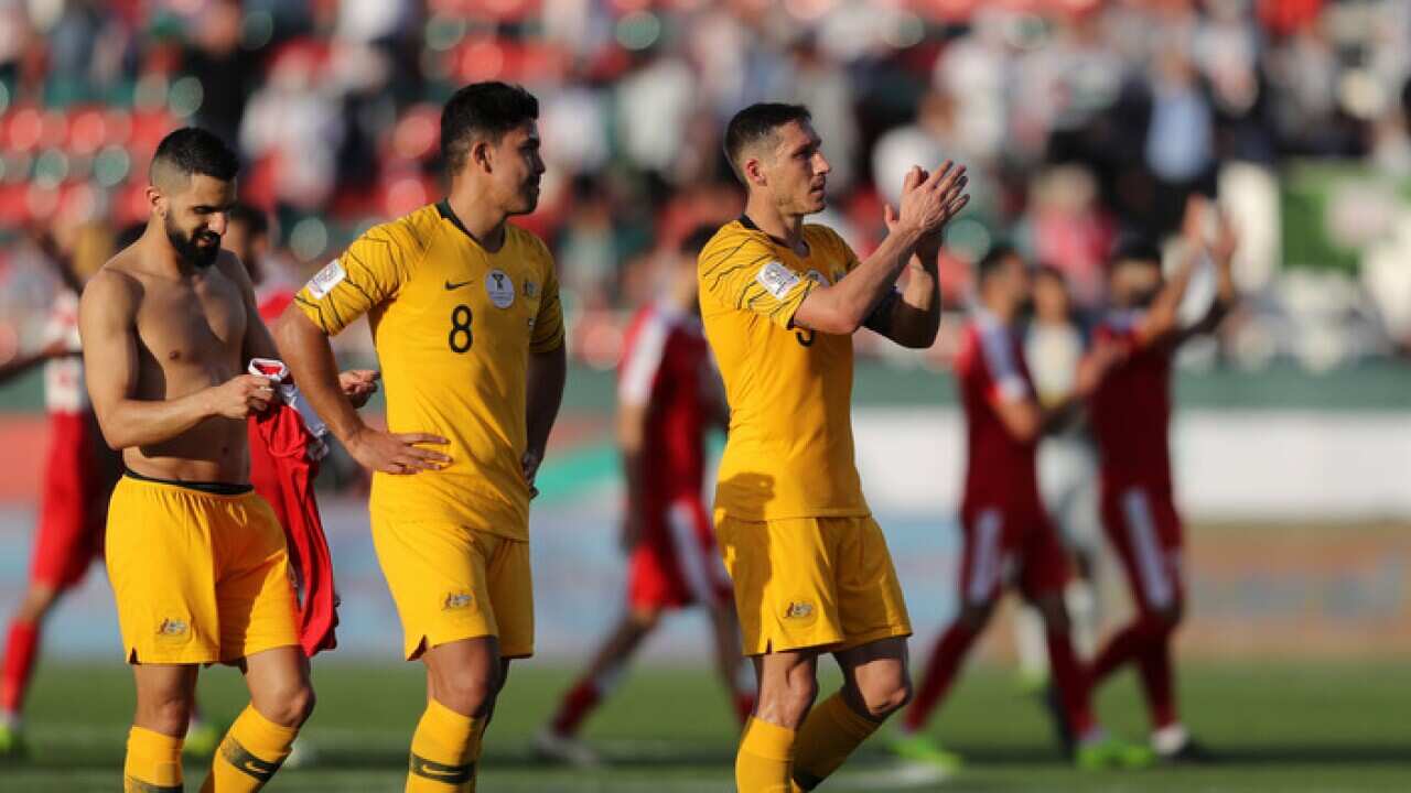 The Socceroos applaud fans in Dubai