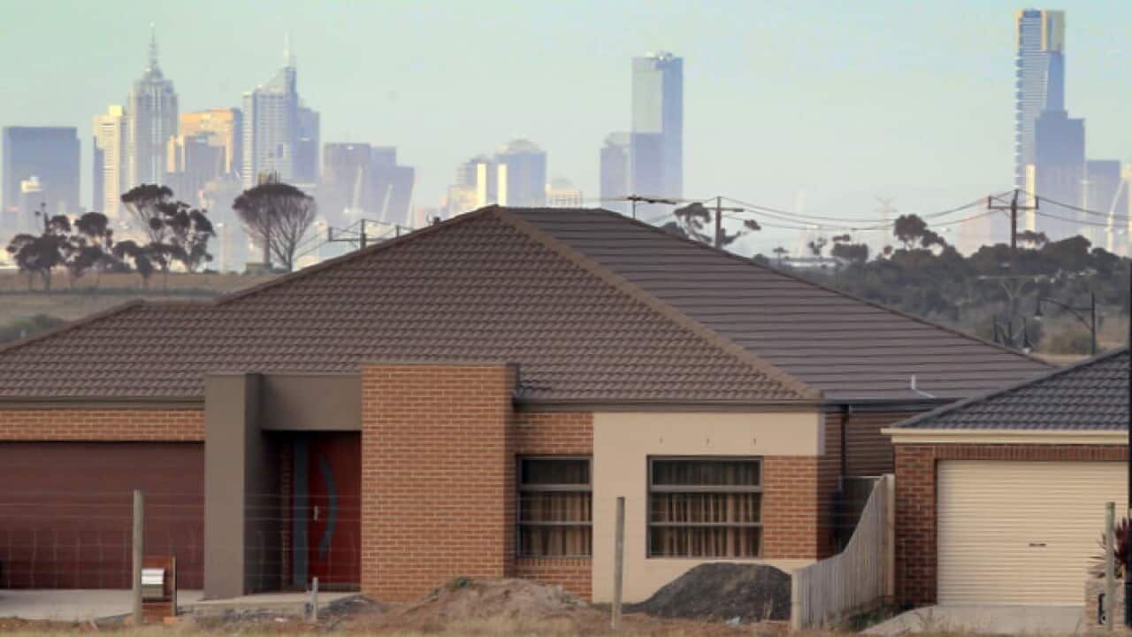 The Melbourne city skyline is seen behind a new home at a housing estate at Deer Park in the outer western suburbs of Melbourne, Wednesday, May 23, 2012. (AAP Image/David Crosling) NO ARCHIVING