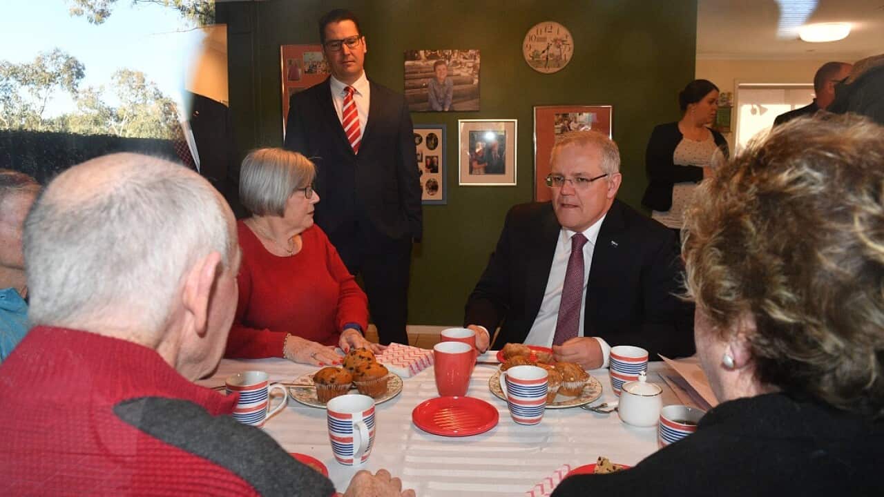 Prime Minister Scott Morrison visits an elderly couple who receive residential care at their home in Greenway, Canberra, Tuesday, September 18, 2018. (AAP Image/Mick Tsikas) NO ARCHIVING