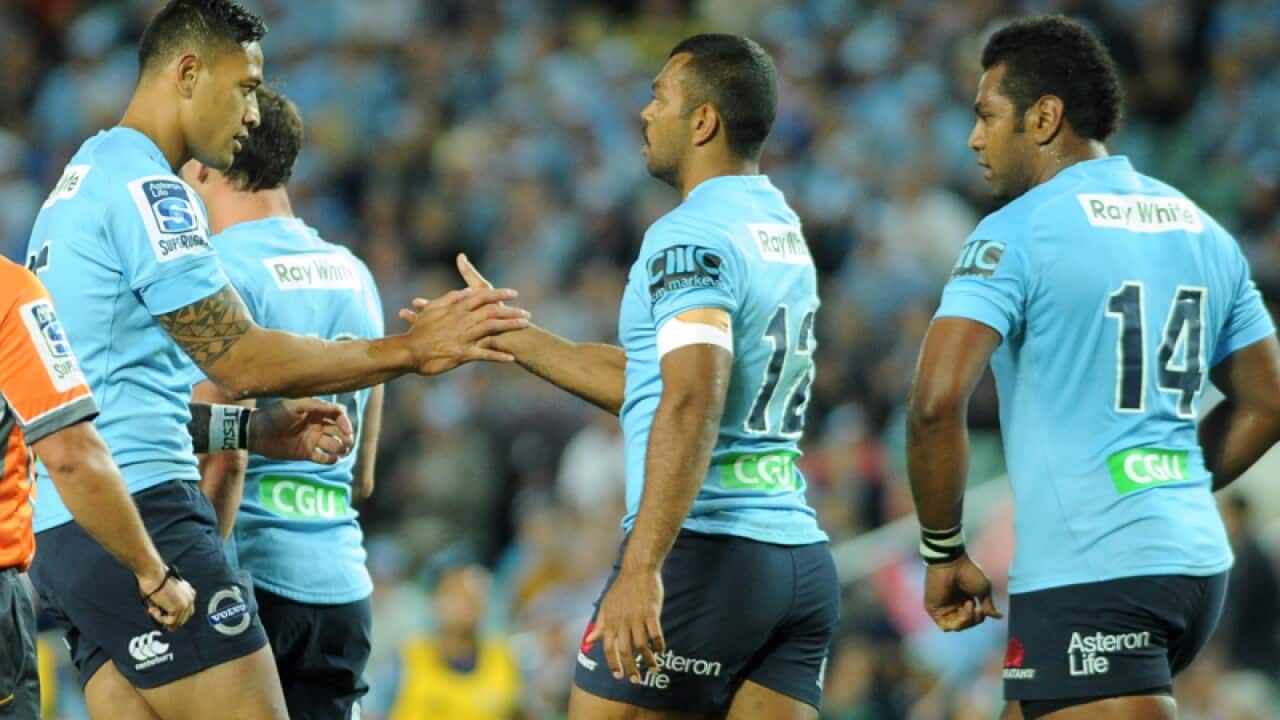 Waratahs' Israel Folau (left) and Kurtley Beale celebrate.