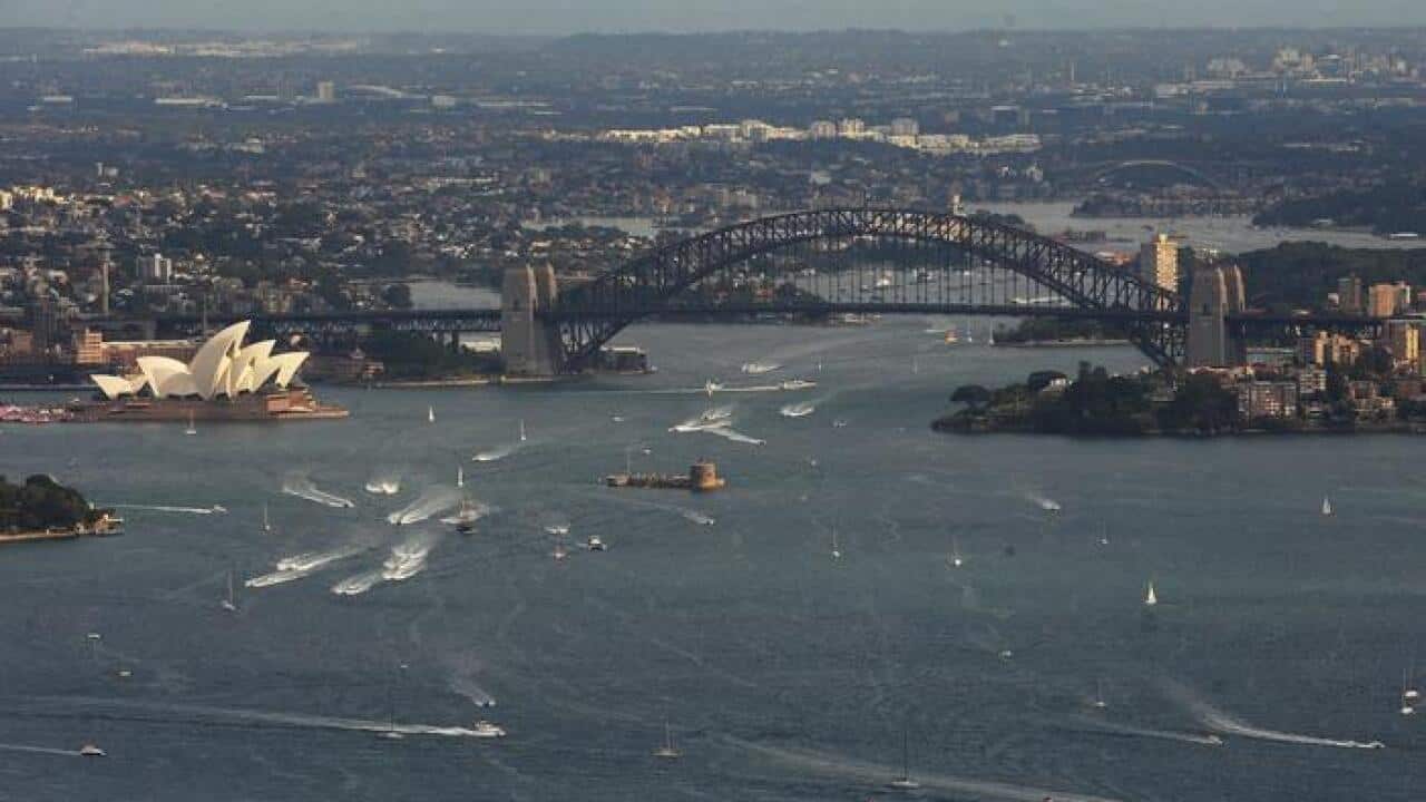 An aerial view of the Sydney Harbour Bridge and the Sydney Opera House, Sydney, Saturday, May 15, 2010. (AAP Image/Dean Lewins) NO ARCHIVING