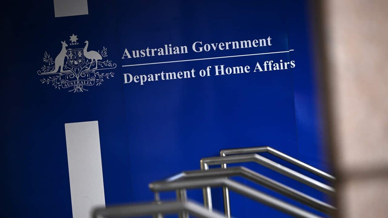 REFUGEES RALLY FOR PERMANENT VISAS