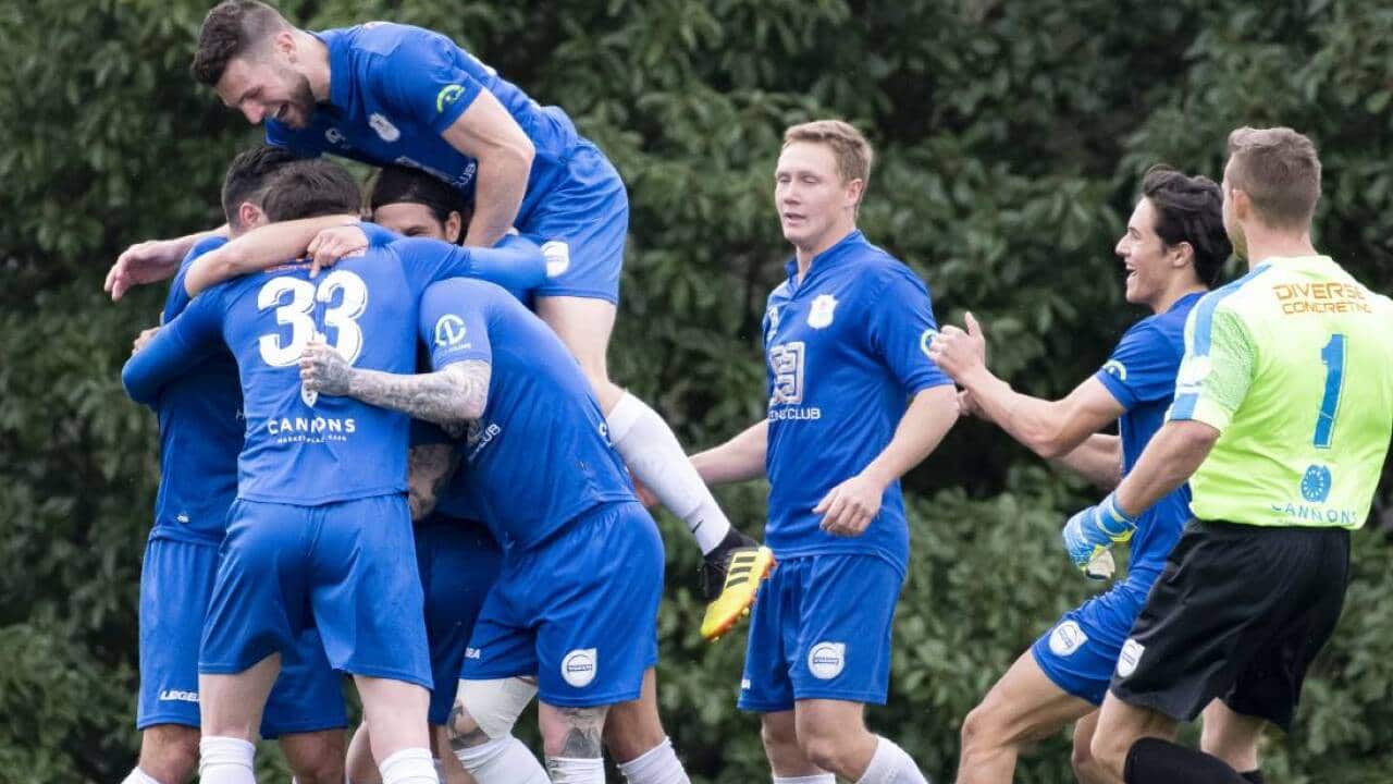 Canberra Olympic beat Tigers to be crowned Capital Football premiers.