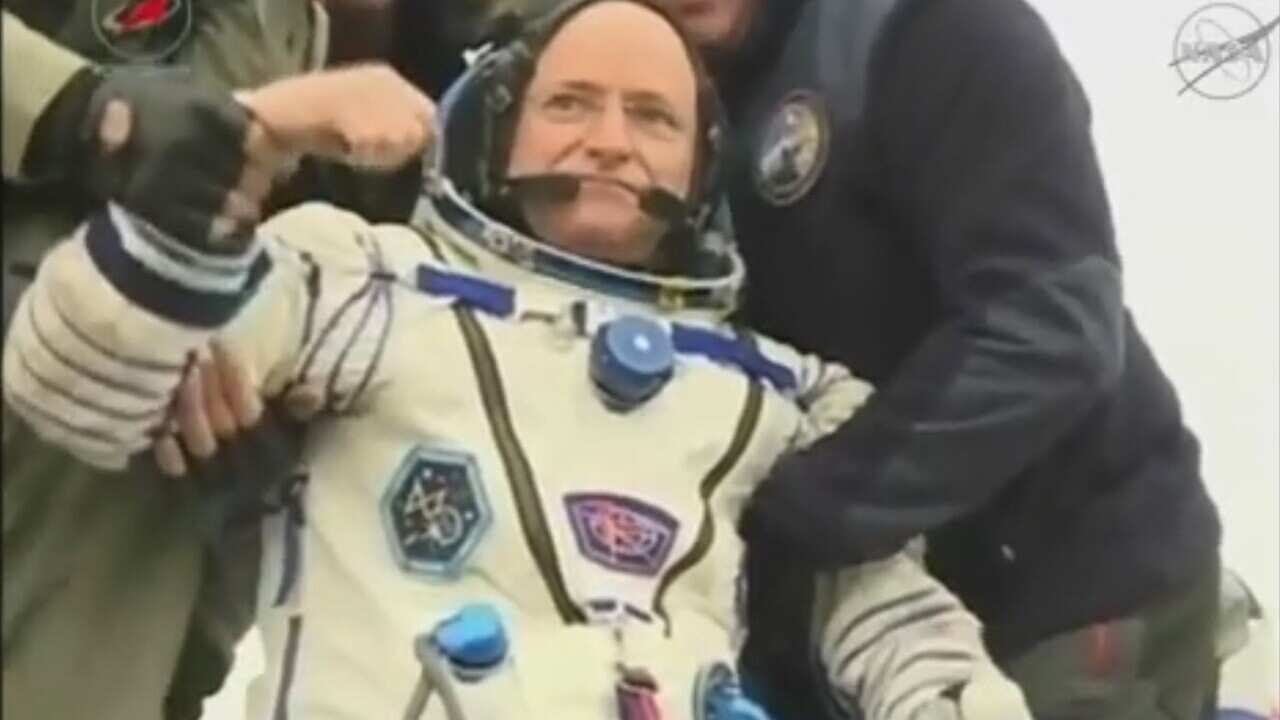 US astronaut Scott Kelly lands safely in Kazakhstan nearly one year after he departed for the International Space Station.