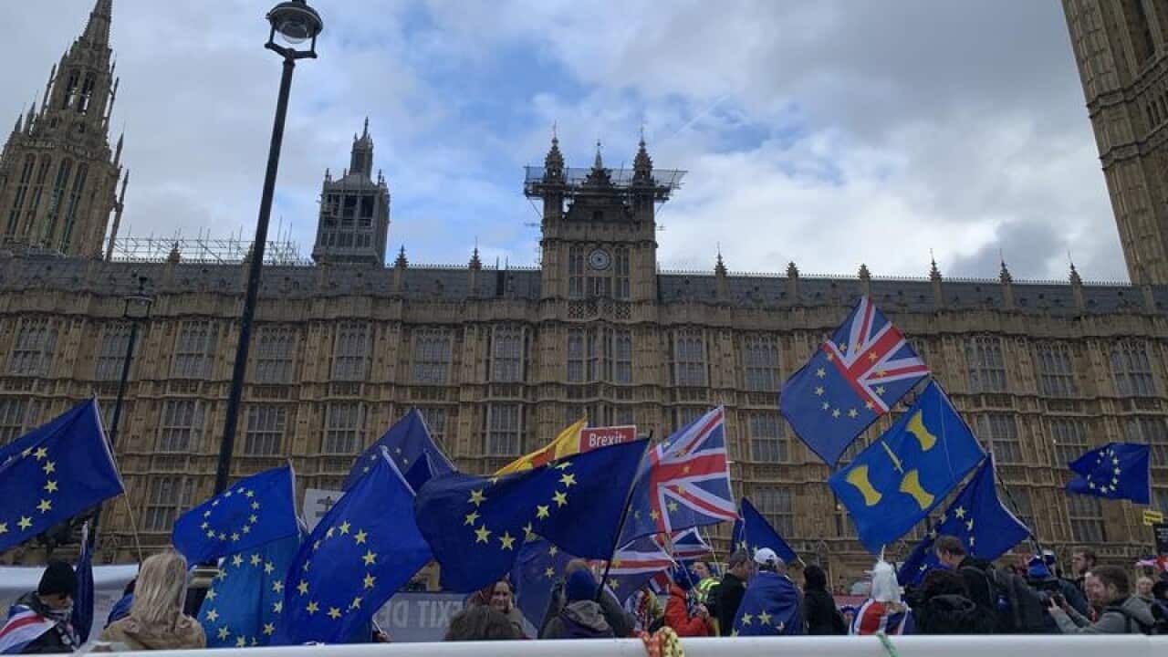 Pro and anti Brexit protesters outside parliament.