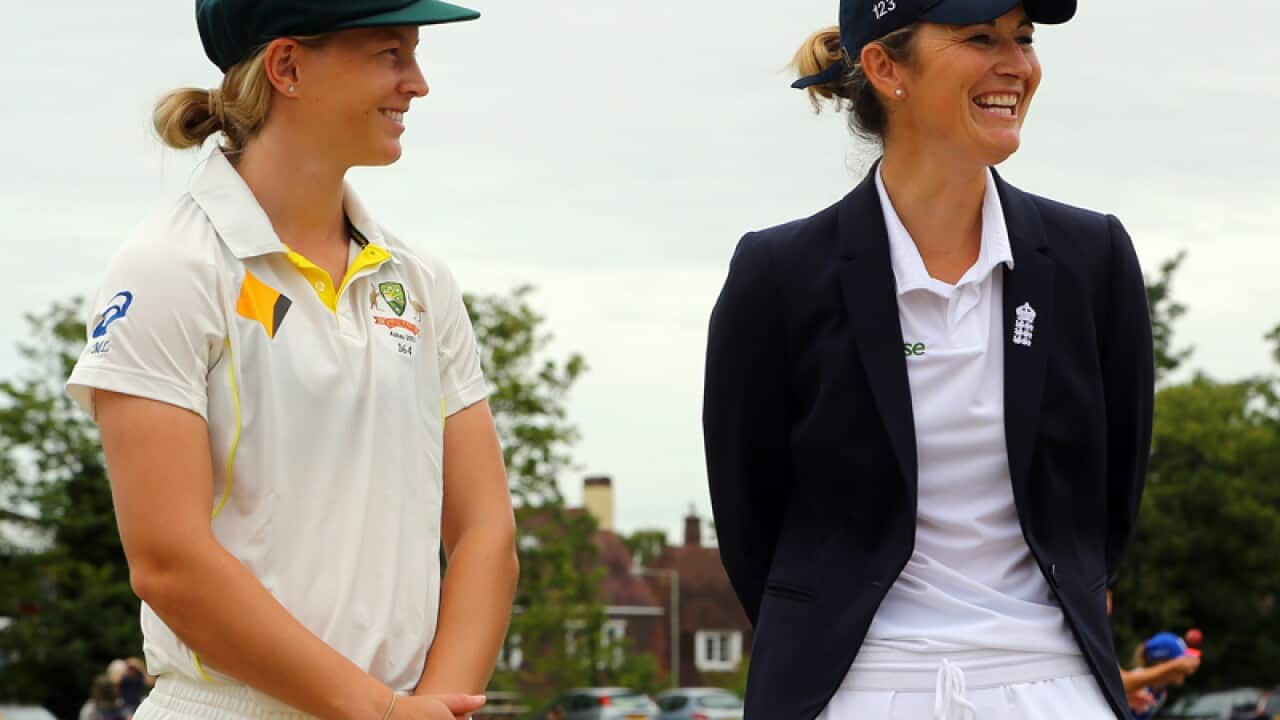 Australian captain Meg Lanning (L) and England's Charlotte Edwards