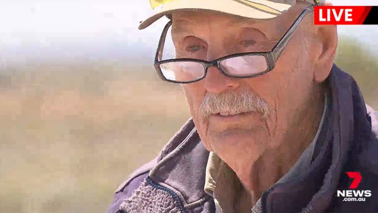 A man wearing glasses